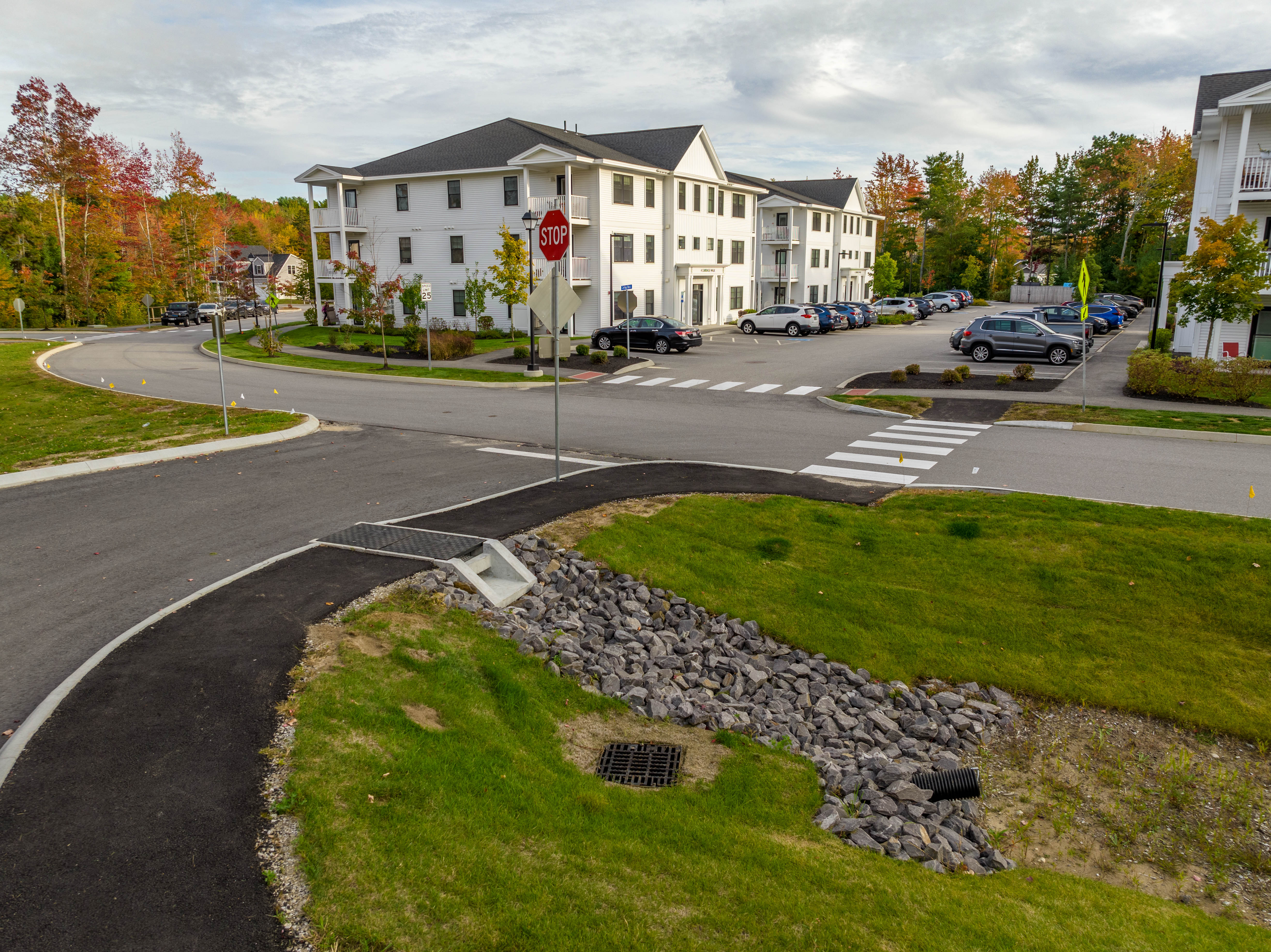 Rain Guardian Foxhole installed crossing a bituminous walking path
